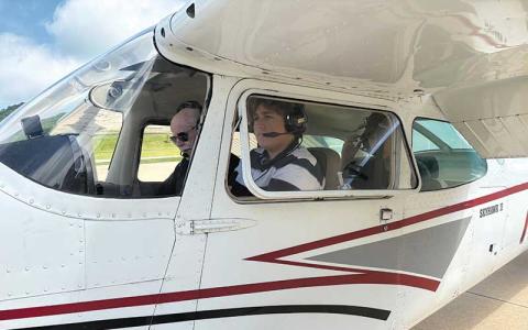 Press photo/Will Woolever - FHS student Myles Bargman in the cockpit as he prepares to take off at the Macon County Airport.