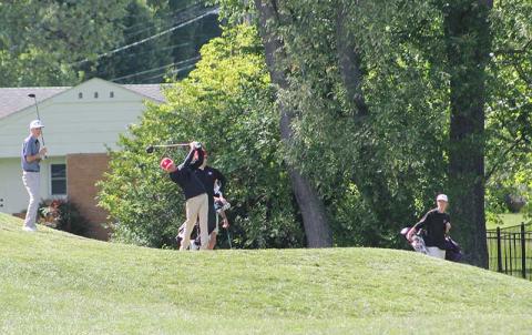 Press photo/Will Woolever - Junior Tanner Jones tees off on Hole #7 at the Waynesville Inn and Golf Club May 6. The ball is visible in the top right corner of the frame. 