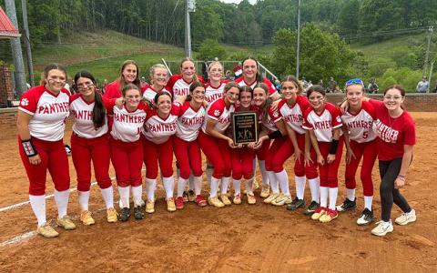 Press photo/Will Woolever - Macon Middle School softball is pictured with their fourth straight Blue Ridge Athletic Conference title plaque after a thrilling 1-0 home win over Smoky Mountain May 7. Pictured are players Palmer Tallent, Emmy Moffitt, Neelley Vinson, Kyleigh Winchester, Chloe Lambert, Ellie Nunley, Karlie Beck, Molly Moeller, Tatum Carrion, Kinley Young, Alyssa Awtrey, Payton Houston, Eva Holland, Payton Manos and Arianna Green; and managers IIaeh Ezechel and Blakeleigh Garrett.