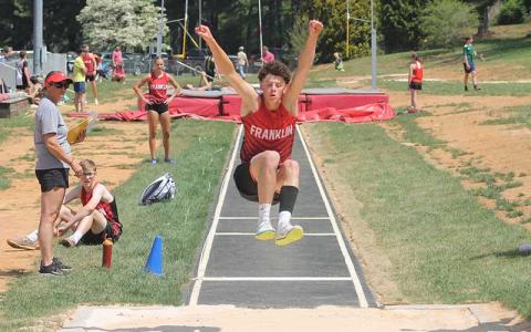 Senior Noah Brannon competes in the long jump in Franklin’s first home meet since 2019 at Macon Middle School April 19. (Press file photo)