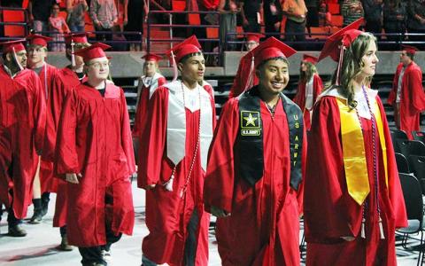 Press photo/Shelby Powell - Franklin High School graduates march in for their commencement ceremony on May 29 at Western Carolina University. See more photos on The Franklin Press Facebook page.