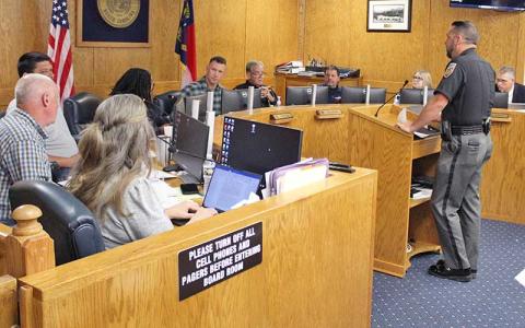 Press photo/Shelby Powell - Sheriff Brent Holbrooks addresses the Macon County Board of Commissioners