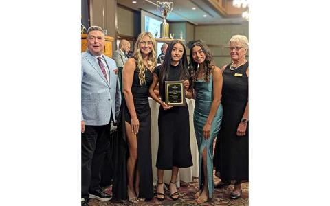 Members of Panther outdoor track and field are pictured with their Division I Female Olympic Sport Team of the Year plaque. From left: Aubrey Haley, Michelle Ortega and Laura Covarrubias.