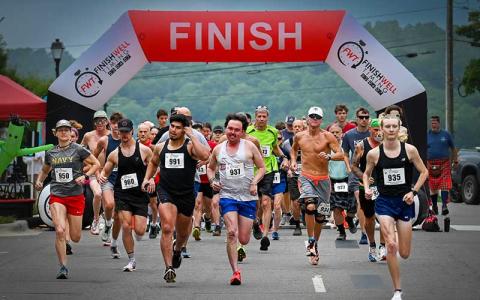Photo/Bob Scott - Braveheart 5K runners take off from the starting line in front of Town Hall June 14.