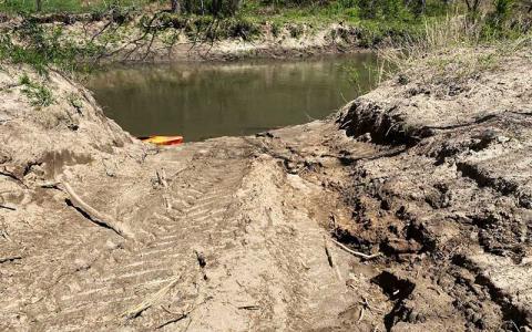 Photo submitted - An ingress/egress site, used by contractors to move equipment into and out of the river, yet to be remediated as of June 22, shows signs of erosion. 