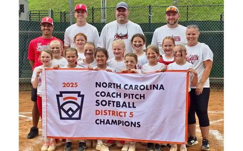 Photo courtesy of Kayla Schulte - Franklin’s Coach Pitch Softball All-Stars show off their championship banner after winning the N.C. District 5 Little League Tournament in Sylva June 28. Team members are Phoenix Wilson, Ivee Harrison, Harper Schulte, Maci Vanderpool, Kinsleigh Pendergrass, Brynnlee Shuler, Amaya Torres, Carrigan Wishon, Adaline Rholetter, Sadie Corbin, Aleah Ammons and Hannah Griffith.