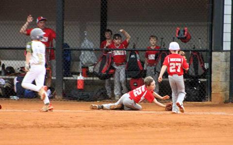 Press photo/Will Woolever - Minor League Baseball’s Judah Savaiko makes a diving catch versus Blue Ridge June 24