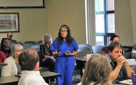 Press photo/Shelby Powell - Dr. Joanne Roesner speaks in support of the Board of Health retaining control of the Health Department during the monthly board meeting on July 29.