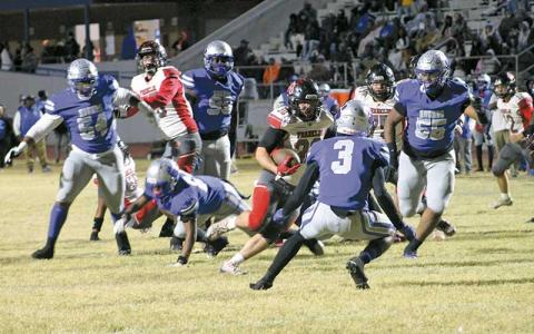 (Press photo/Will Woolever) Then-junior Addix Sutton finds room to run in Franklin’s state playoff football game at Statesville last November.