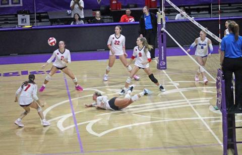 Press photo/Will Woolever - Panther volleyball tries to keep a ball in the air after a difficult diving save from Bristol Brooks (foreground) versus Brevard at WCU Sept. 18.