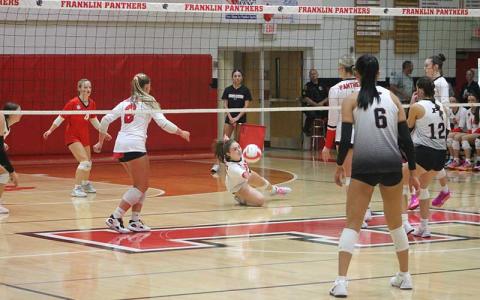 Sophomore Ella Raby makes a difficult diving save versus Pisgah on Tom Raby Court Sept. 23. (Press photo/Will Woolever)