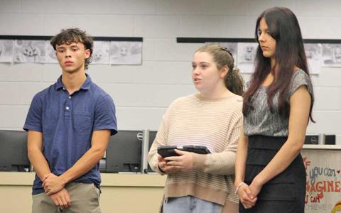 Press photo/Shelby Powell - Franklin High School students Reid Laseter, Samantha Wilson and Arianna Soto speak against the Macon County Board of Education’s bell-to-bell cell phone policy. 