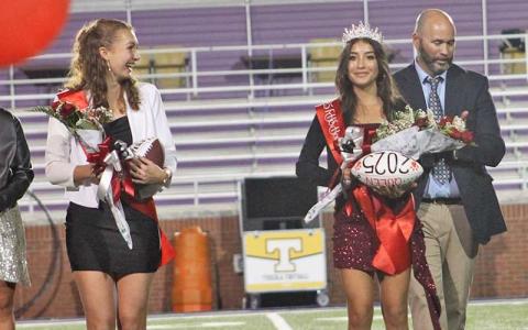 Press photo/Will Woolever - Michelle Ortega (right) was crowned Franklin High School Homecoming Queen as Maid of Honor Abigail Pope and principal Blair King look on.