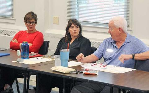 Press photo/Shelby Powell - School board members Stephanie Laseter, Hilary Wilkes and Jim Breedlove discuss capital projects for the school system. 