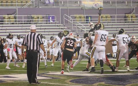 Press photo/Will Woolever - Sophomore Daiveon Hall tries to bat down a pass in Franklin’s homecoming game versus Tuscola Oct. 3.
