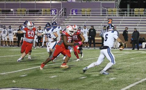 Press photo/Will Woolever - Panther defensive linemen (from left) Liam Daniels, Caiden Berry and Daiveon Hall chase down the Mustang quarterback in Franklin’s 26-8 win over Smoky Mountain Oct. 24.