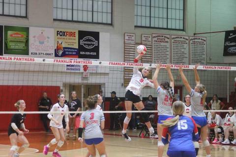 Press photo/Will Woolever - Sophomore Emma Hatch lifts a ball over the net versus West Henderson Oct. 6.