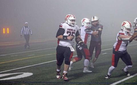 Press photo/Will Woolever - Senior captain center/nose guard Mace Waldroop returns a kickoff in Franklin’s third-round state playoff game at Hickory Nov. 21. 