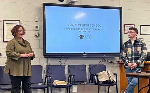 Press photo/Shelby Powell - Architect Emily Kite (left) and interior designer Trent Webb gave a presentation Oct. 29 on ongoing decisions on materials to be used for the new Franklin High School.