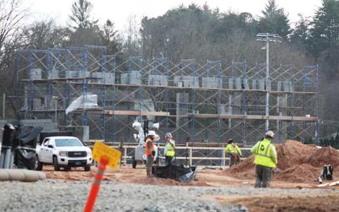 Press photo/Shelby Powell - Contractors at work on the walls for the new Franklin High School gym.