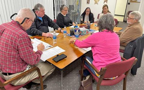 Press photo/Mia Overton - Canvass, the process of certifying an election, was held Nov. 14 for the Franklin and Highlands elections. Macon County Board of Elections members and staff pictured (from left) are Chair John Vanhook, BOE Secretary Gary Dills, Kathy Tinsley, Deputy Director Judy Fritts, Director Melanie Thibault, Paul Niskanen and Lynne Garrison.