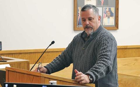 Press photo/Shelby Powell - DSS Director Patrick Betancourt speaks to commissioners about a proposal to recruit his successor.