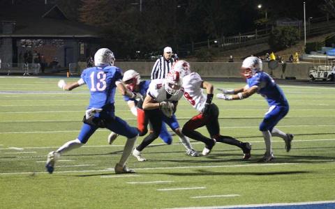 Press photo/Will Woolever - Junior Damion Bowles nears the end zone in Franklin’s regular season-finale win at West Henderson on Halloween.