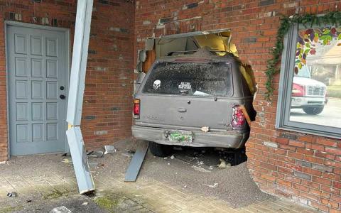 Photo submitted - A Ford Explorer crashed through the Magnolia Mission building on West Main Street.