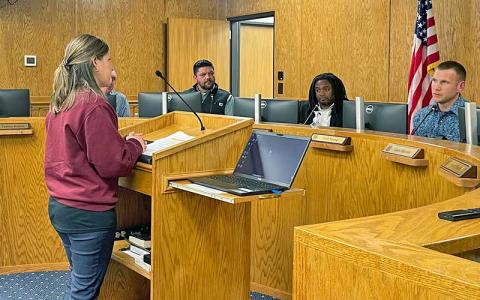 Press photo/Shelby Powell - Interim Solid Waste Director Jamie Picou speaks to county commissioners about new landfill construction. 