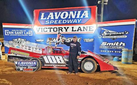 Photo submitted - Local driver Chuck Southard shows off his first-place trophy following a Southern Wedge Late-Model Association race at Lavonia Speedway in Georgia recently. 