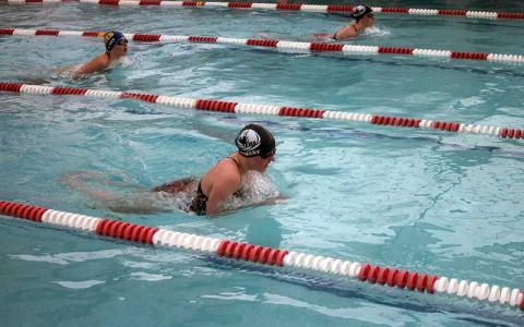 Press photo/Will Woolever - Macon Early College senior Alyse Remery competes for the Foxes in the 100-yard breaststroke at Franklin Health and Fitness Nov. 22.