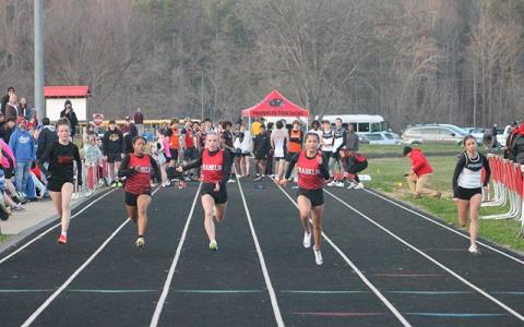 Press photo/Will Woolever - Kai Pelletier (left), Anna Timan and Michelle Ortega run a close race in the girls 55-meter dash at Macon Middle School Dec. 3.