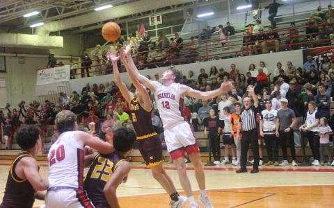 Press photo/Will Woolever - Senior Peyton Hervey fights for a loose ball versus Cherokee Dec. 4.