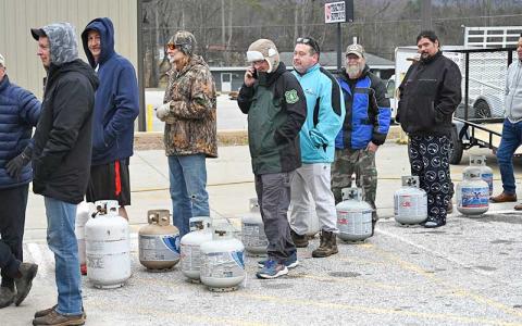 Photo/Bob Scott - Macon County escaped the worst of Winter Storm Fern, but people were preparing for the possibility of icy roads and power outages over the weekend. A line of folks was waiting to fill up propane tanks at Tractor Supply on Saturday.