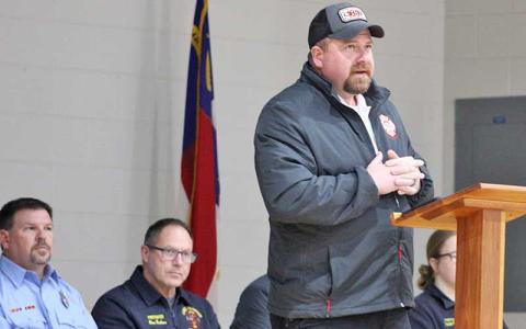 Press photo/Shelby Powell - Dustin Pendergrass speaks to the Cowee, Burningtown and Iotla community members Cowee Volunteer Fire and Rescue now serves. 