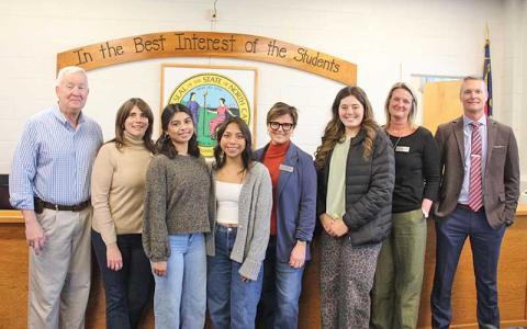 Press photo/Shelby Powell - Students from Franklin High School Student Leadership dropped by the Macon County Schools office to deliver gifts to the school board for School Board Appreciation Month. From left: Jim Breedlove, Hilary Wilkes, Arlene Perez, Ashlee Hernandez, Stephanie Laseter, Meliah Mason, Diedre Breeden and Josh Lynch. 