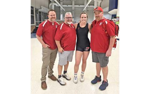 Photo submitted - Senior Carrie Holland is pictured with Panther coaches (from left) Joel Schick, Jimmy Barnett and Matt Bailey after the 5A West Women’s Regional at Parkwood High School last week.