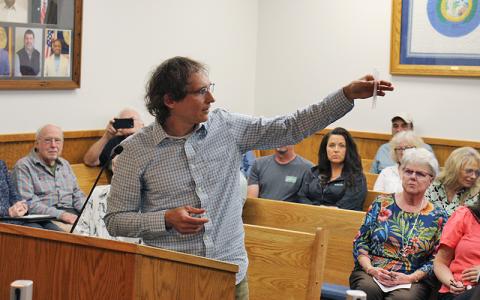 Press photo/Shelby Powell. Jason Love speaks to the Macon County Board of Commissioners at the March 10 meeting.
