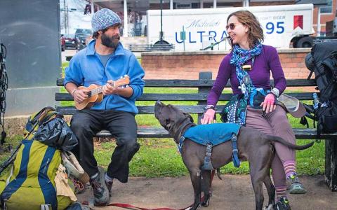 Photo/Bob Scott - Hikers wait for a ride on the Macon County Transit hiker shuttle