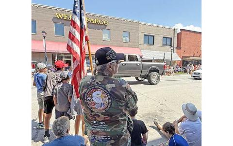 (Press photo/Mia Overton) Victor Moraloza watches Franklin’s July 4th parade in 2025. Moraloza served in Vietnam with the U.S. Army from 1968-1971. He said being in the military gave him a stronger appreciation for life. He had three brothers who also served in Vietnam, with three of his family members in the 173 Airborne Brigade from 1966-1974. His brother Carlos died on March 9, 1969, while serving with the “Big Red One” – the name given to the 1st Infantry Division. The back of his jacket is embroidered 