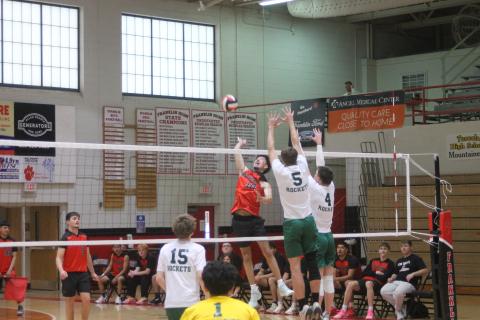 Press photo/Will Woolever. Miguel Ortega elevates for a spike versus A.C. Reynolds March 18. 