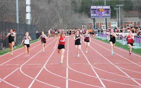 Press file photo - Anna Timan wins the girls 100-meter dash at the Western Carolina Kickoff meet in Cullowhee March 6. 