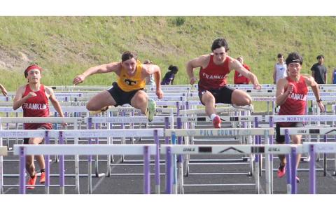 From left, Chad Engel, a Tuscola Mountaineer, Jonas Phillips and Ken Modlin compete in the 110-meter hurdles at the Mountain Eight Conference Championships at North Henderson April 30. (Press photo/Will Woolever)