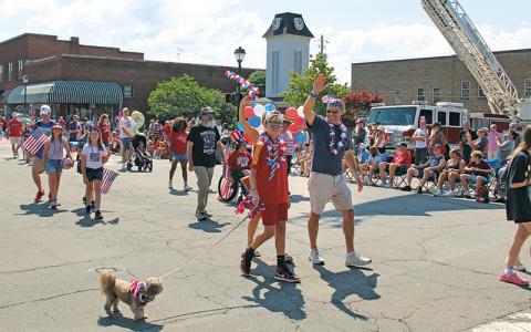 Press file photo - All are welcome to join in the July 4 parade. Put on your most patriotic outfit and meet at Town Hall at 10:30 a.m. The parade begins at 11 a.m. followed by the Little Mr. and Miss Firecracker contest and the patriotic pet contest.