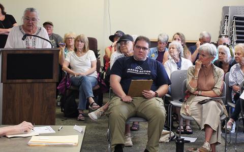 Press photo/Shelby Powell - Margaret Pickett speaks to the Macon County Planning Board to advocate against its recommended 3-2 structure for electing commissioners.