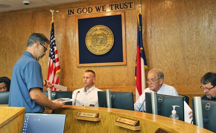 Press photo/Shelby Powell - County Planning Director Joe Allen talks with county commissioners about options for repairs and renovations at Macon Early College.