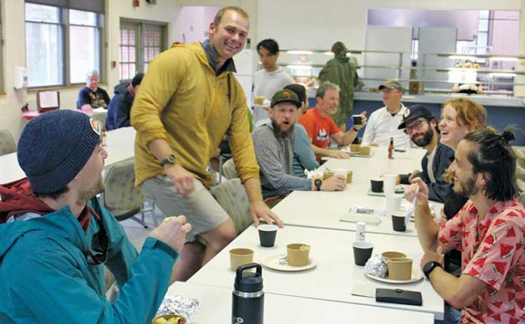 Press photo/Shelby Powell - Teams participating in the Smoky Mountain Relay stopped for a free breakfast hosted by Cowee School volunteers. Each member of this team was from the Southeast, with members from Bryson City, Chattanooga, Nashville, Sylva and Asheville. 