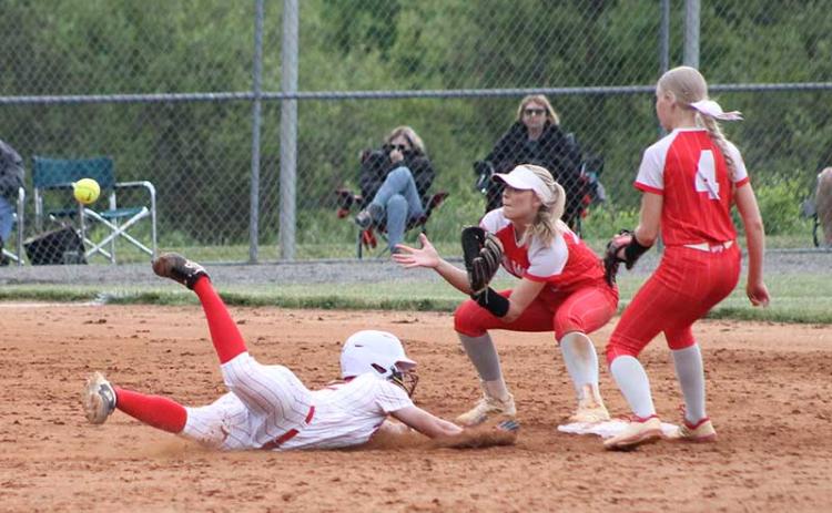 Suzanna Cabe slides safely into second base while executing a fourth-inning steal at Macon Middle School May 8. (Press photo/Will Woolever)