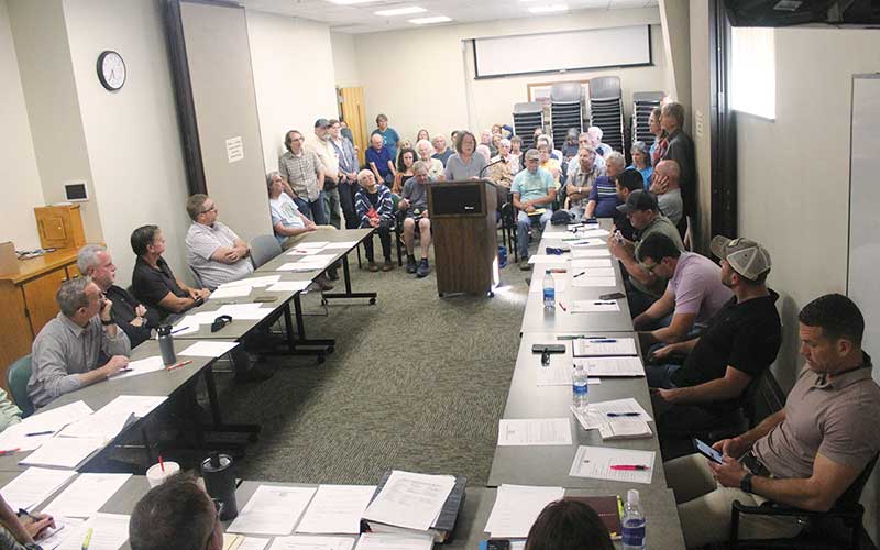 Press photo/Thomas Sherrill - A full house at the May 2 Macon County Planning Board meeting as Susan Ervin speaks.