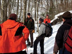 volunteers with the Nantahala Hiking Club meet before beginning a trail maintenance work day. 